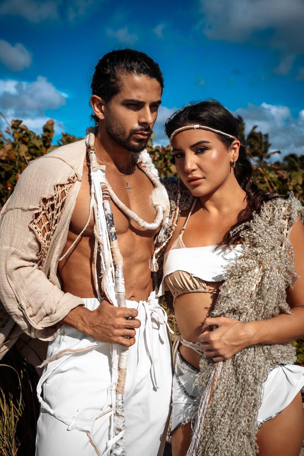 Couple in cream artisan wear photographed in warm Miami light